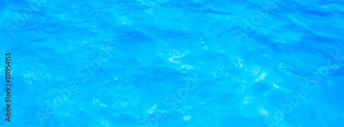 Wallpaper Mural Blue pool water with sun reflections Torontodigital.ca