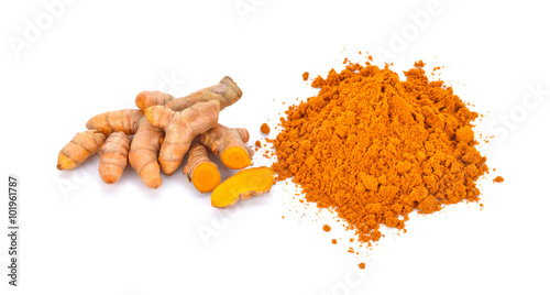 turmeric roots and turmeric powder on white background