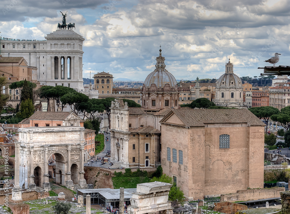 Roman Forum. Monument of Vittorio Emanuele II, Arch of Septimius Severus and Church of Saints Luke and Martina. Italy