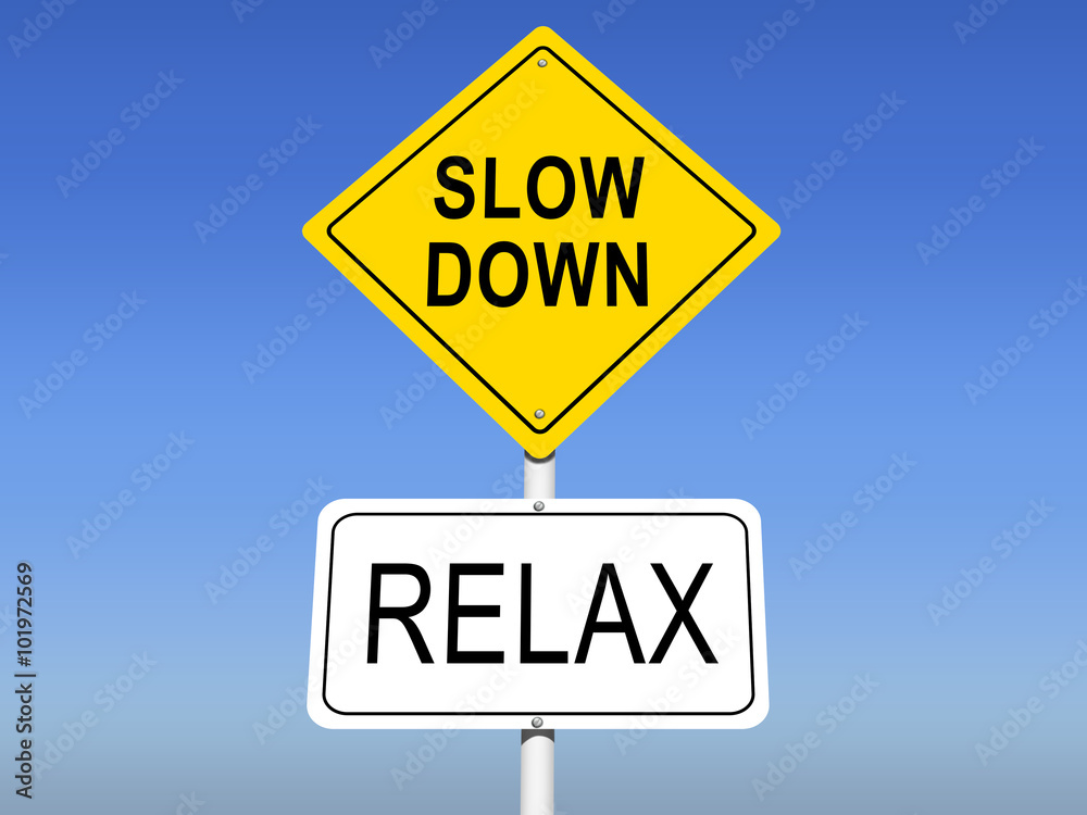 Slow Down - Relx Yellow Road Sign with Sky Background Slow Down - Relx Yellow Road Sign with Sky Background