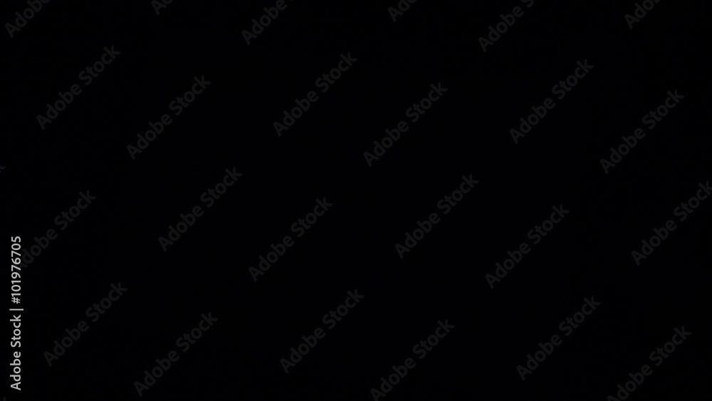 Music notes with ray of light on black Music notes with ray of light on black