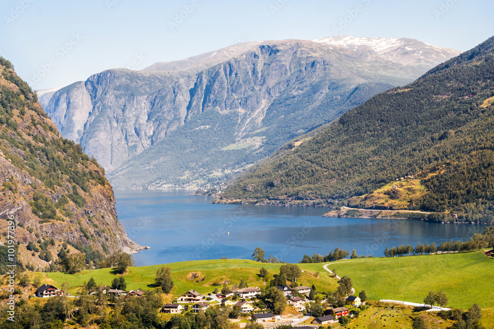 Landscape with houses in mountains at Norway fjord