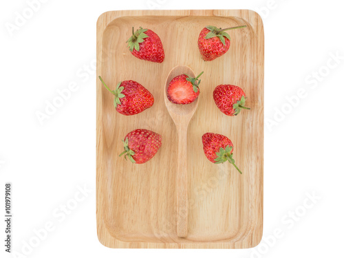 Fresh strawberry on wooden tray, on white background