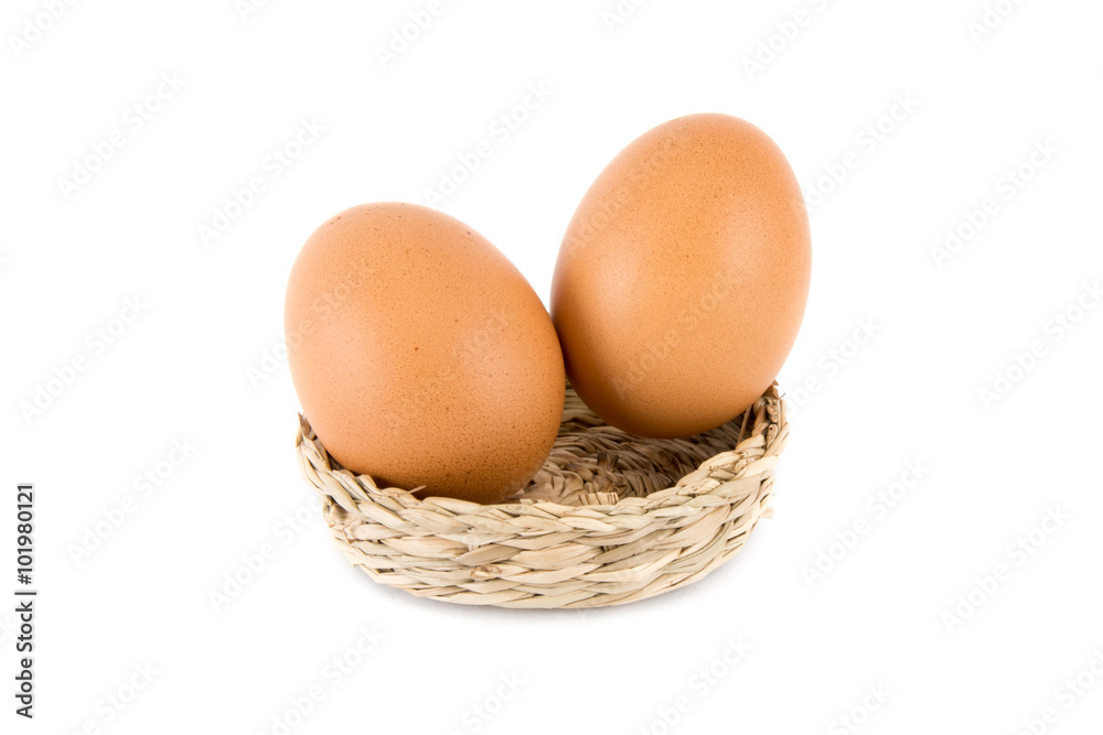 Eggs in basket on white background Eggs in basket on white background