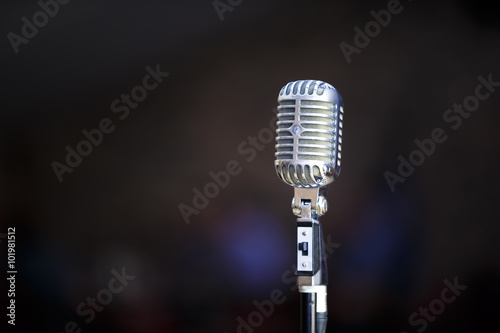 Retro microphone on a blur background