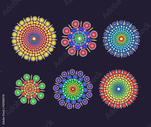 A set of fancy circular multicolored dotted ornament graphic elements for design and single use.
