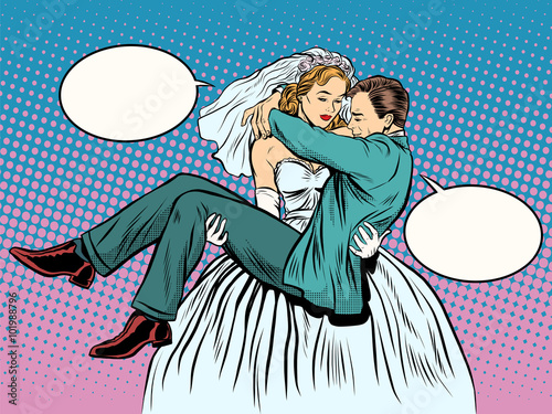 Wedding bride groom carries in her arms