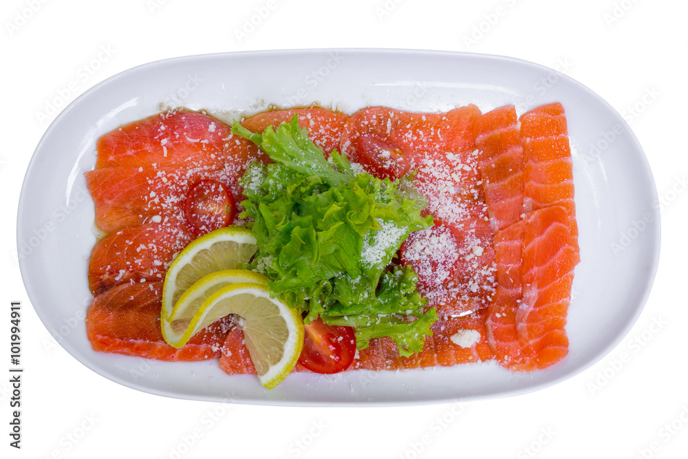 Salmon carpaccio with lemon, top view, isolated Salmon carpaccio with lemon, top view, isolated