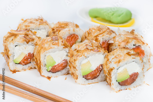 Japanese sushi with salmon, avocado and Philadelphia cheese in a