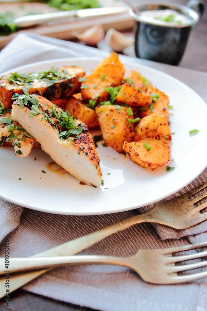 Roasted chicken fillet of chicken breast with fried potatoes Roasted chicken fillet of chicken breast with fried potatoes