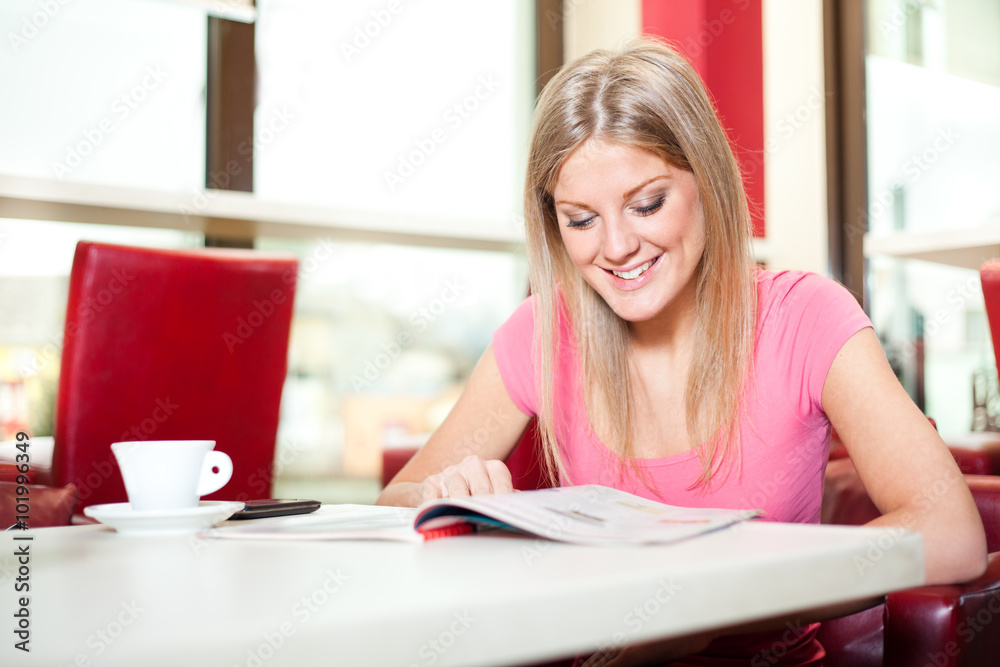 Happy woman in cafe Happy woman in cafe