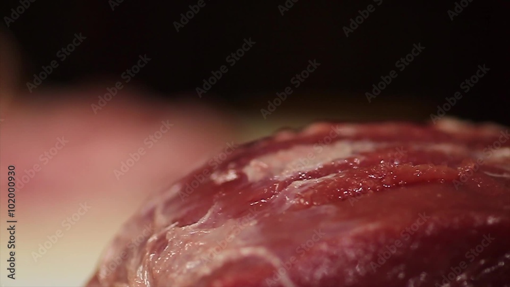 Fresh raw meat on table focus in, shef beat off meat focus in. Pork. Restaurant.