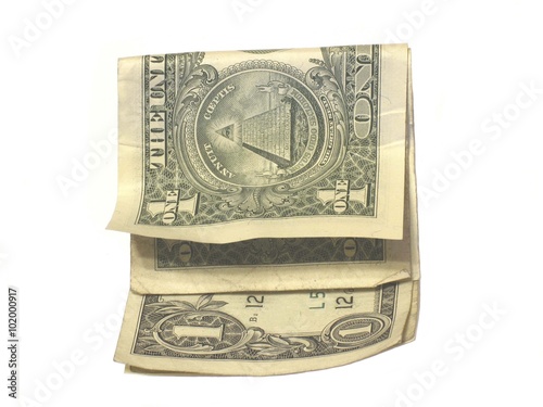 Fotografie Folded dollar bills on white background.