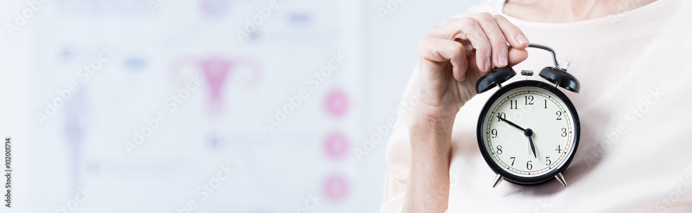 Elderly pregnant with alarm clock Elderly pregnant with alarm clock