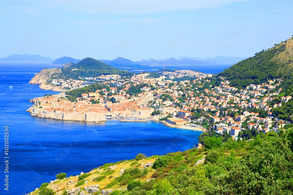 Panoramic view of Dubrovnik touristic destination with green coast and blue sea