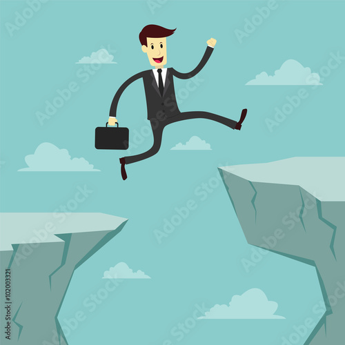 Businessman Jumping across the chasm