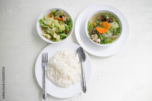 soup with and mixed vegetable stire-fried served with white rice