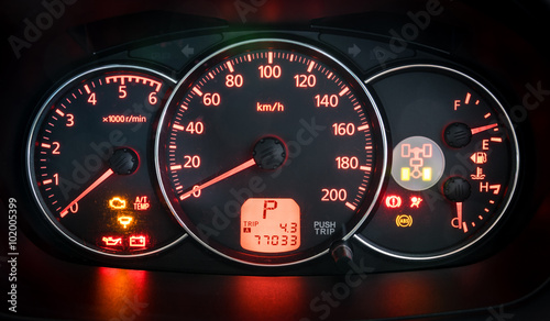 Modern car illuminated dashboard closeup