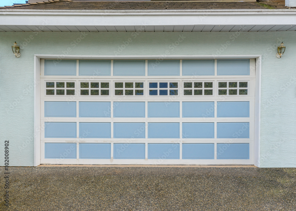 Luxury house with double garage door in Vancouver, Canada. Luxury house with double garage door in Vancouver, Canada.