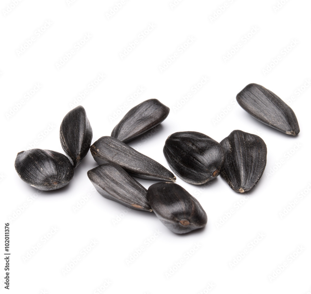 Sunflower seeds isolated on white background close up Sunflower seeds isolated on white background close up