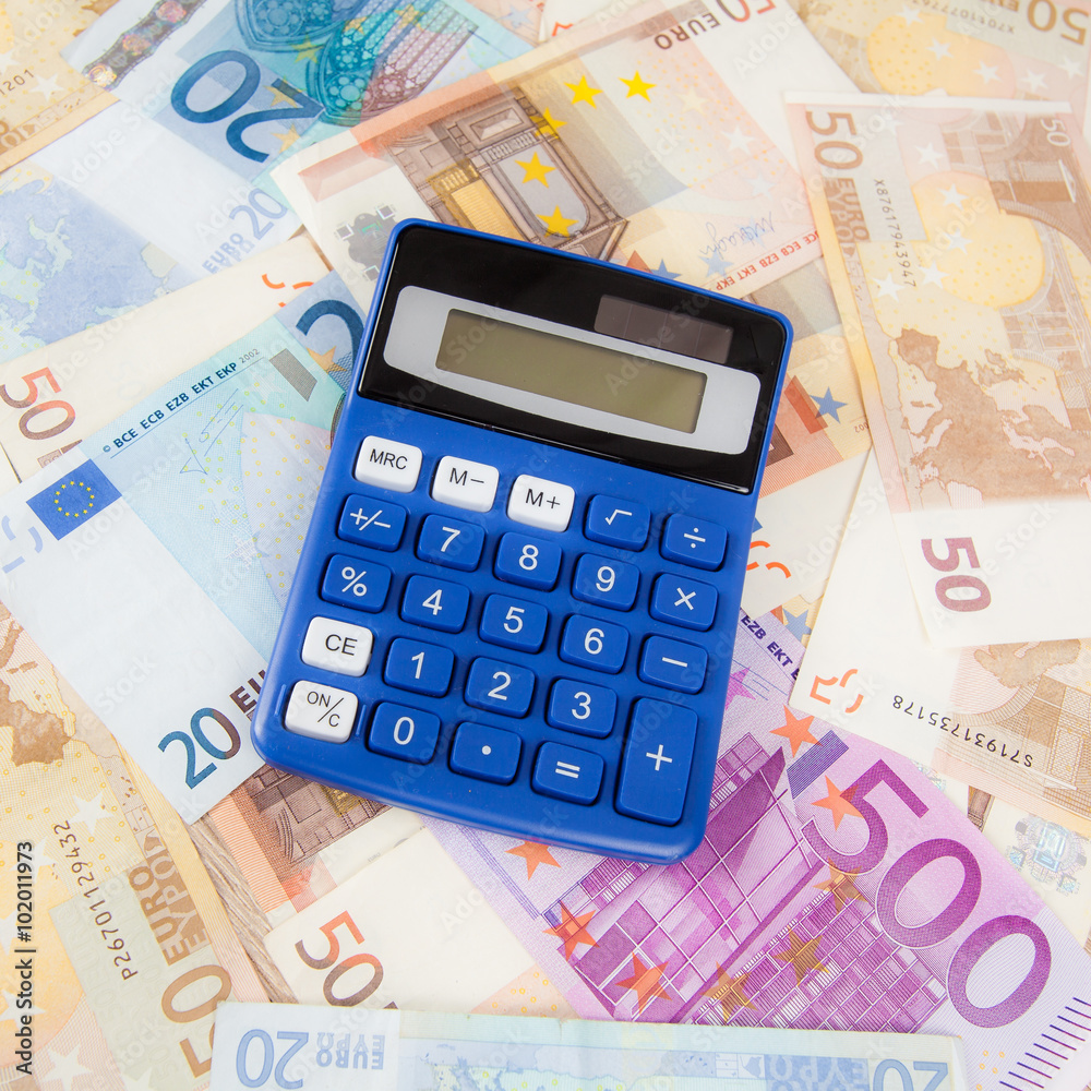 Calculator with Euro notes. Budget Concept. Money and calculat Calculator with Euro notes. Budget Concept. Money and calculat
