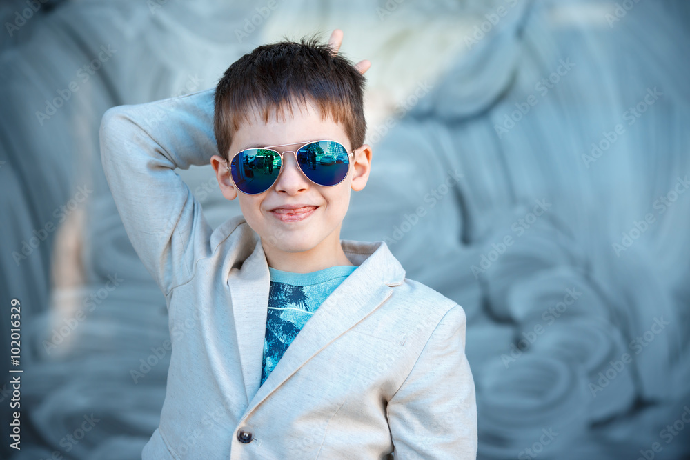 Little boy in a nice suit and glasses. Children portrait Little boy in a nice suit and glasses. Children portrait