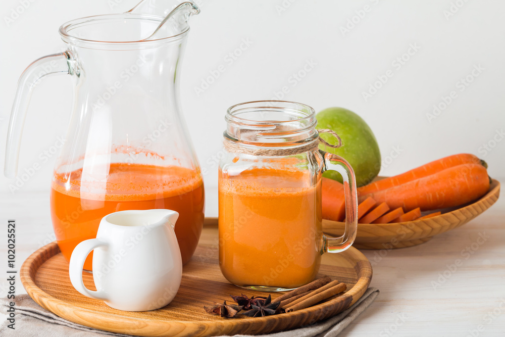 Fresh carrot juice in a glass Fresh carrot juice in a glass