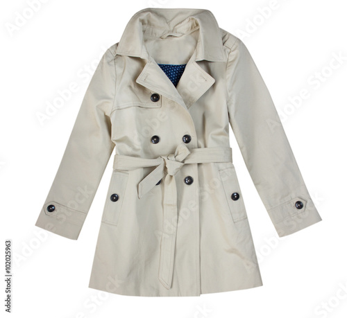 Fashion beige child girl trench coat isolated on white. photo