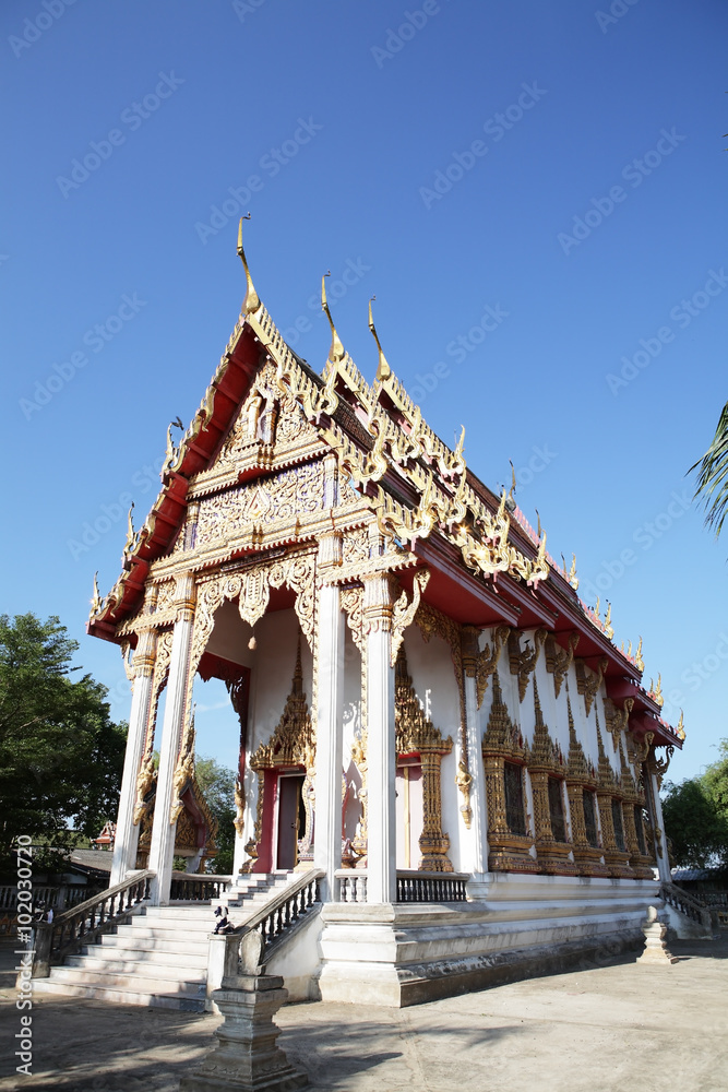beautiful thai temple against blue sky.