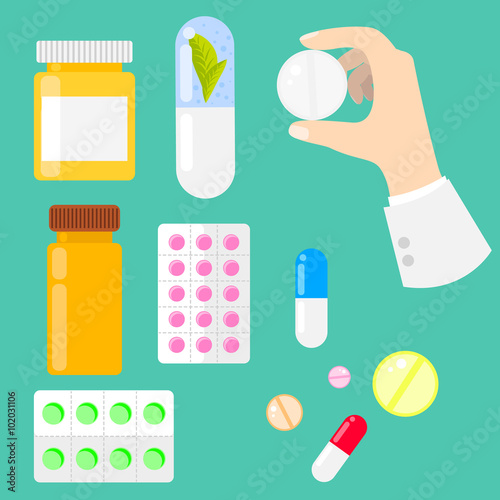 Pills, vitamins and drug capsules in flat style. © YoPixArt
