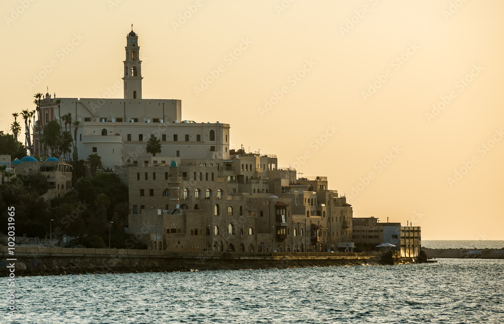 Sunset over Mediterranean Sea and old city of Jaffa in Tel Aviv, Israel