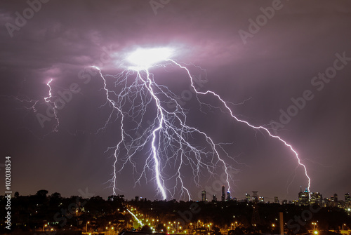 Lightning over city skyline