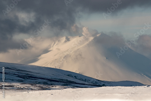mountains covered with snow in a Blizzard on the Kuril Islands