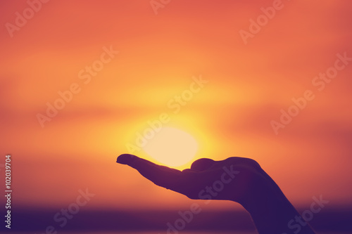 Sun on female hand