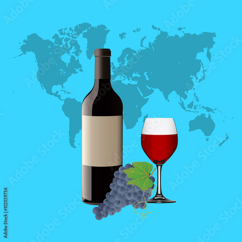 wine glass with red wine, bottle of wine and grapes