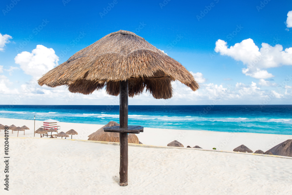 Sun umbrellas on beautiful beach