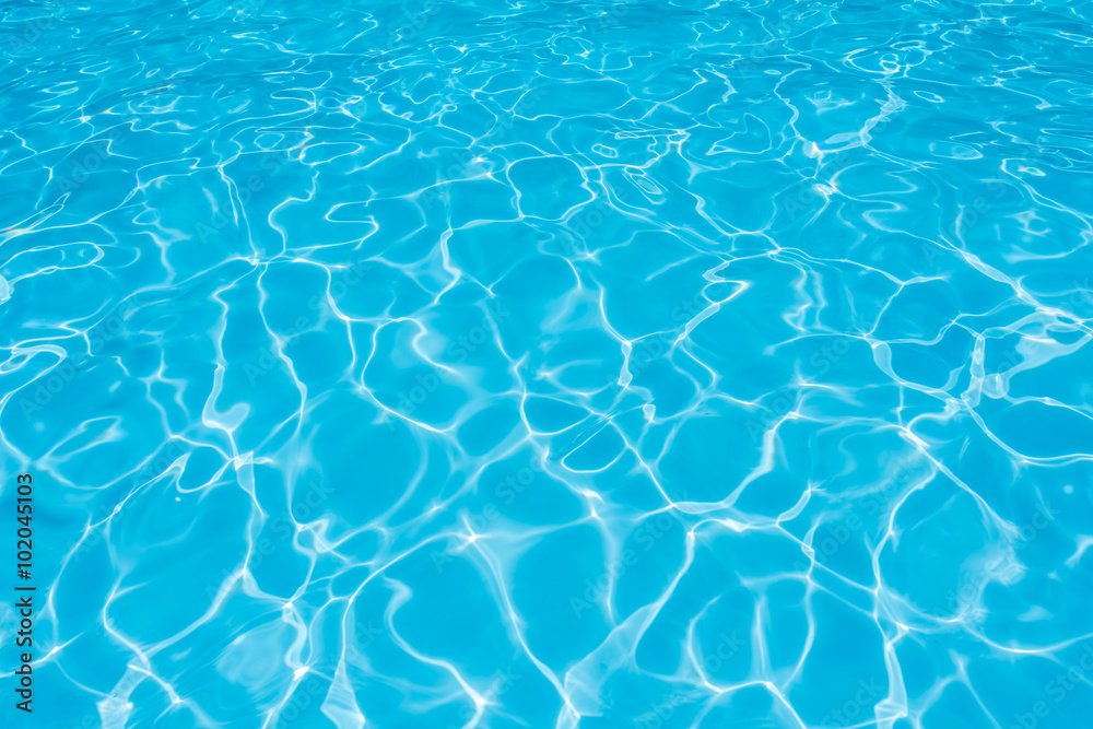 Ripple Water in swimming pool with sun refleaction