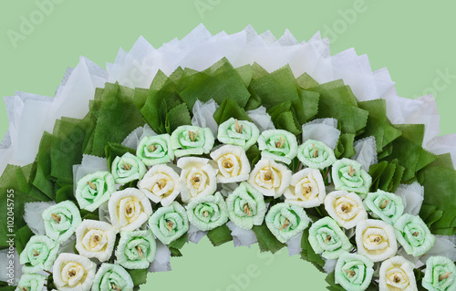 roses flower wreath for use in Thai funeral on green background