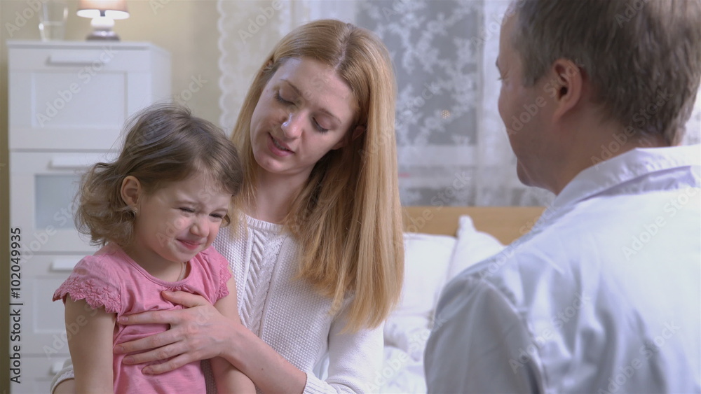 Angina. A pediatrician examines the throat of a little girl. 4k. Angina. A pediatrician examines the throat of a little girl. 4k.