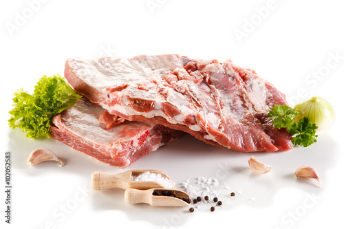 Raw pork ribs on white background  photo