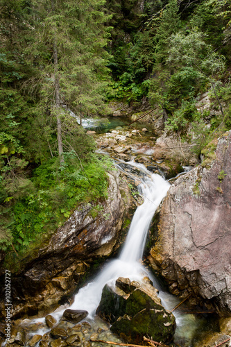 Waterfall with stones in forest, Sea Eye, Zakopane