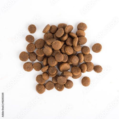 Dried cat or dog food isolated on white background top view