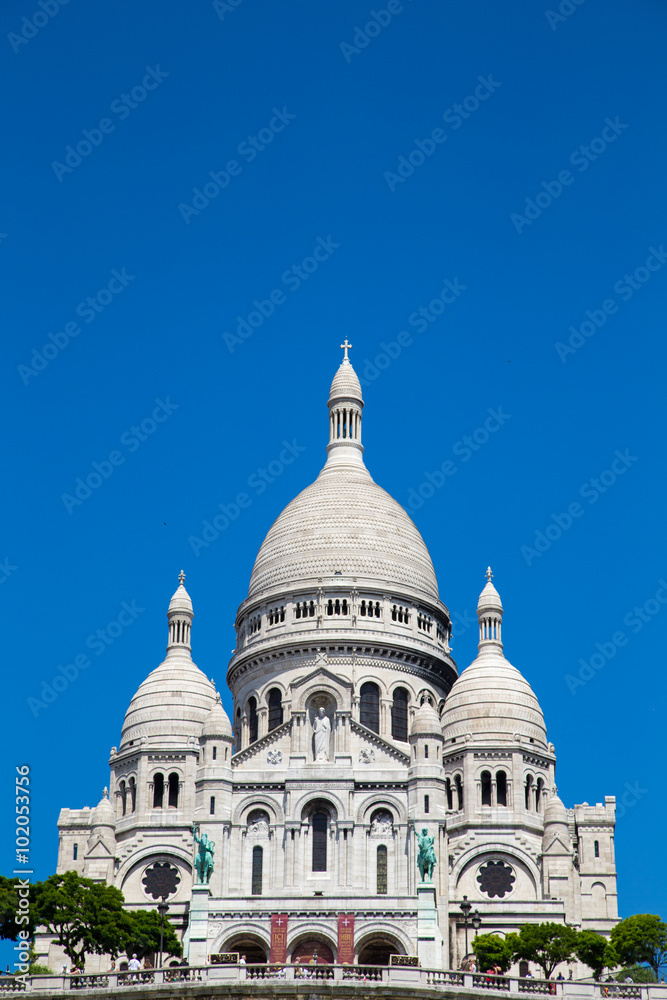 View of Basilica of the Sacred Heart of Paris with cloudy sky in