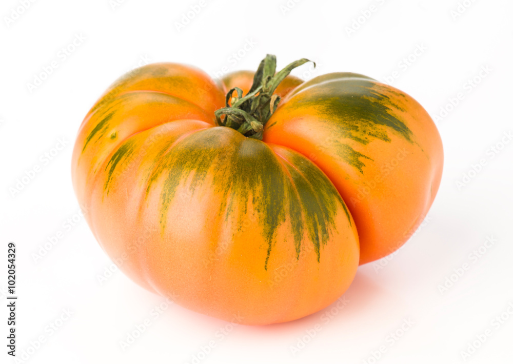 ripe natural tomato isolated on white