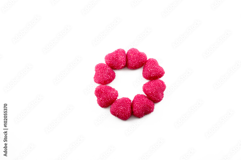 heart candies in the shape of the letter O isolated on white background heart candies in the shape of the letter O isolated on white background