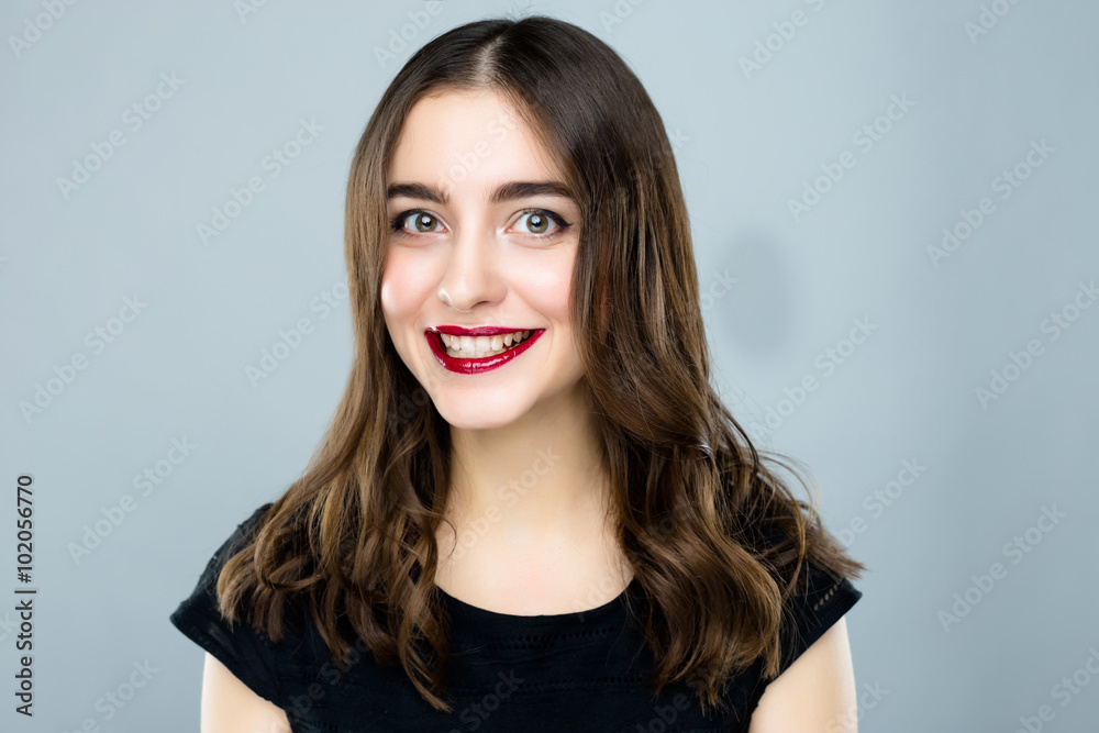 Close up portrait of Happy emotional young woman with smile