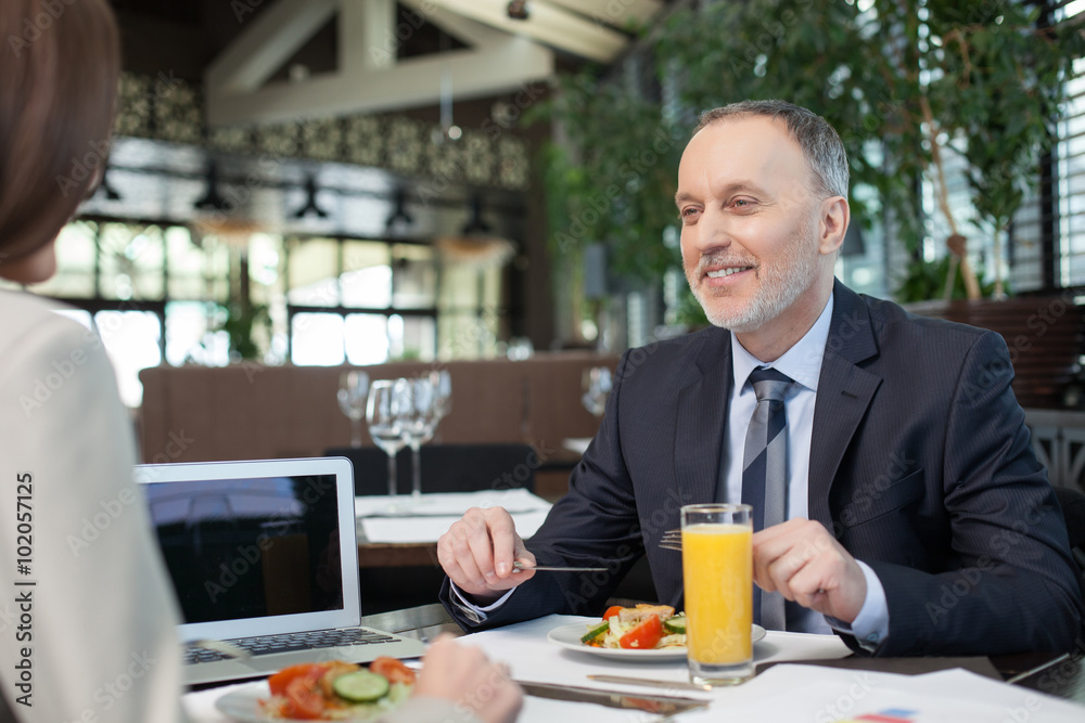 Skillful two managers on meeting in restaurant Skillful two managers on meeting in restaurant