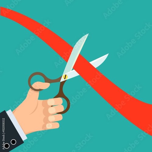 scissors cut red ribbon