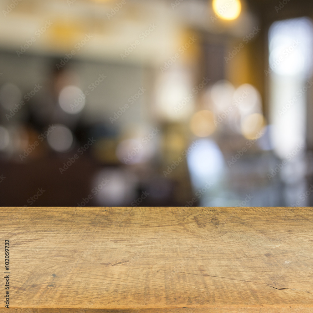 Blur cafe and wood floor texture background Blur cafe and wood floor texture background