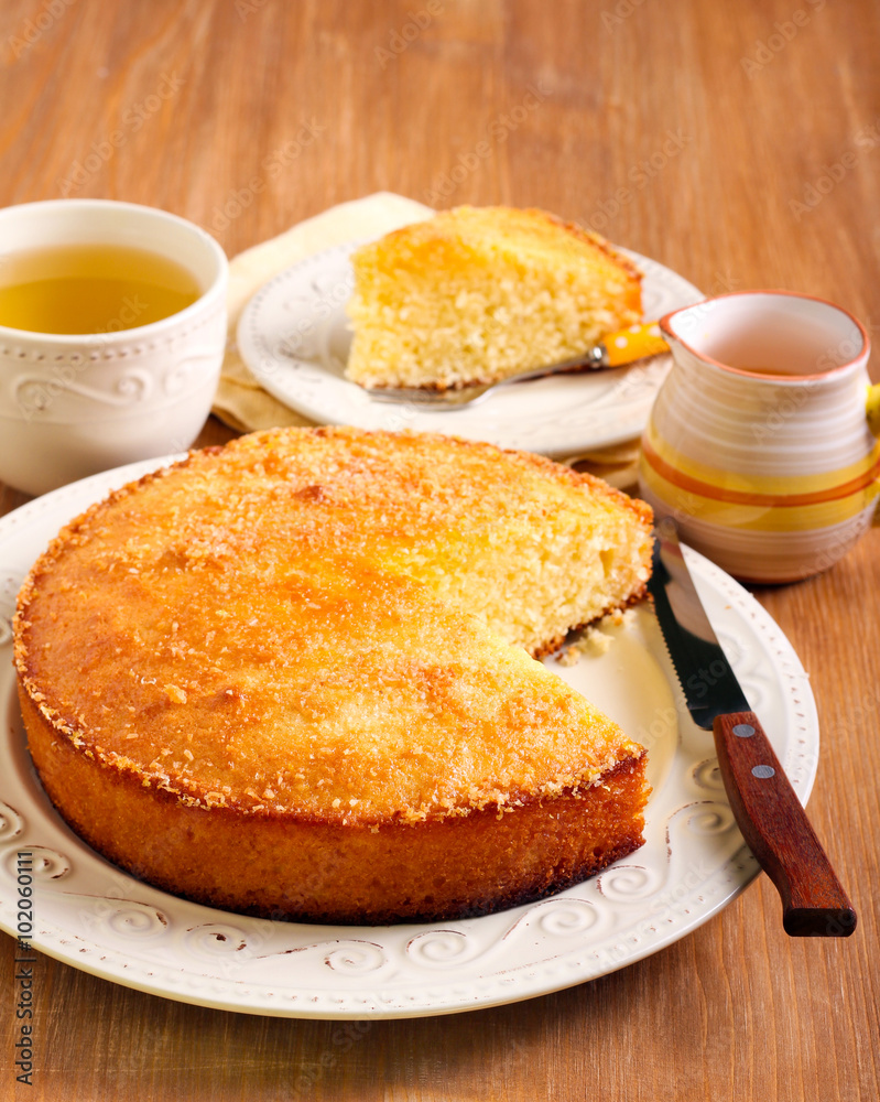 Coconut citrus syrup cake
